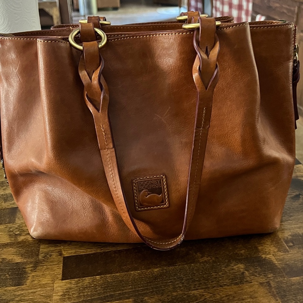 Dooney and Bourke Elegant Brown Leather Tote with Braided Handles